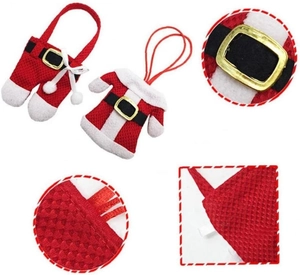 Detail of Santa clothes and boots cutlery holders for Christmas table decor