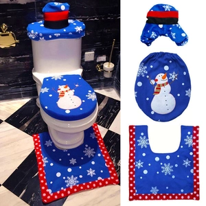 Three-piece blue snowman toilet set with top hat tank cover and U-shaped bath mat