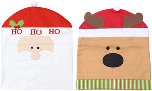 Detail of Christmas chair covers featuring Santa and reindeer with HO HO HO lettering