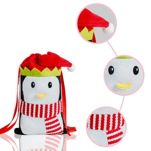 Detail of penguin felt candy bag showing festive stitching and striped scarf texture