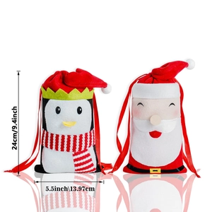 Christmas drawstring candy bags with penguin and Santa designs, size 24cm by 13.97cm