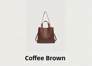 Close-up of coffee brown tote bag featuring premium lychee pattern leather and fine stitching