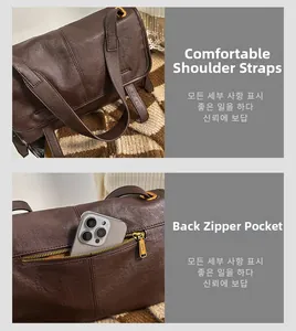 Brown vintage leather messenger bag featuring wide shoulder straps and a rear zipper pocket