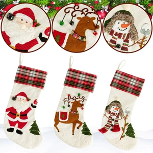 Three-piece Christmas stocking set featuring 3D Santa, Reindeer, and Snowman designs