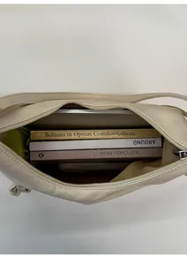 Top view of large capacity tote bag interior with books and spacious storage