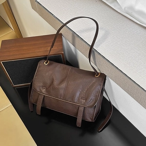Retro dark brown oil wax leather shoulder bag for women with vintage metal ring accents