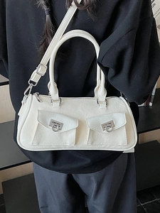 White textured leather baguette bag with silver hardware and adjustable shoulder strap