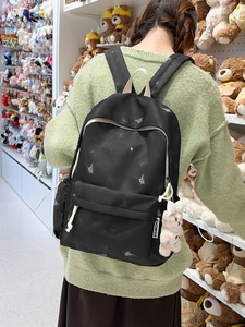 Sac à dos d'école en nylon noir à motifs papillons blancs et pendentif ours en peluche