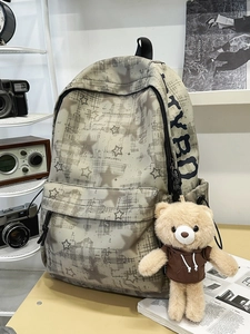 Light grey camouflage star print backpack with cute bear charm and vintage aesthetic