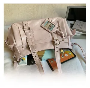 Pink PU leather tote bag with interior view showing capacity for tablets and cosmetics