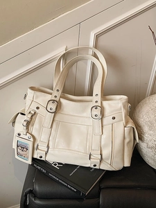 Grande borsa tote crema in stile retrò con fibbie decorative e tasche laterali