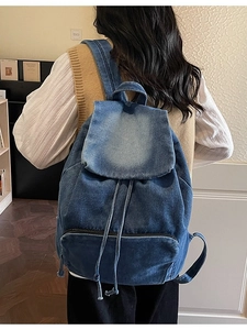 Retro washed dark blue denim backpack with drawstring closure and large capacity storage