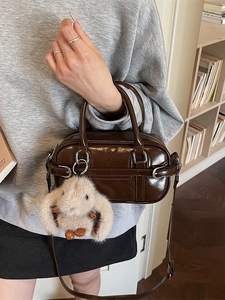 Dark coffee patent leather mini Boston bag with adjustable strap and cute bunny charm