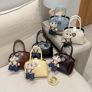 Retro shell handbag in six colors with metallic buckle and cute teddy bear pendant