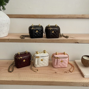 Detailed collection of mini quilted chain bags in five colors with golden camellia hardware