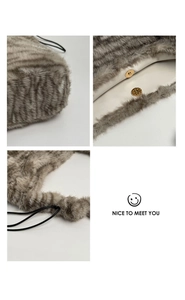 Detail of faux fur tote bag with animal pattern, magnetic clasp and black strap
