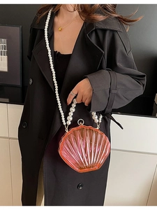 Elegant pink acrylic shell-shaped crossbody bag with pearl strap for evening parties