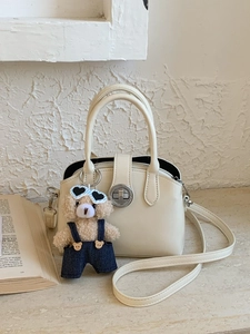 Minimalist cream white leather handbag with metal lock and cute teddy bear charm