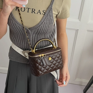 Quilted dark coffee crossbody bag with gold chain strap and camellia metal hardware