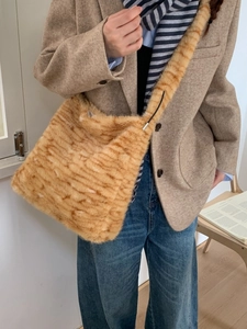 Plush faux fur tote bag with orange leopard pattern for autumn winter commuting style