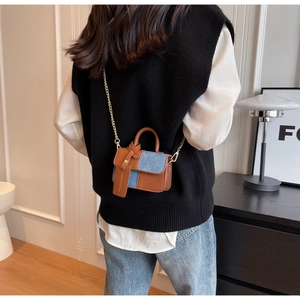 Brown leather and blue denim patchwork mini crossbody bag with gold chain strap detail