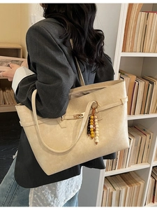 Minimalist beige PU leather large tote bag with beaded charm and gold hardware