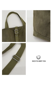 Détails du sac cabas en toile vert olive avec coutures renforcées et boucles métalliques