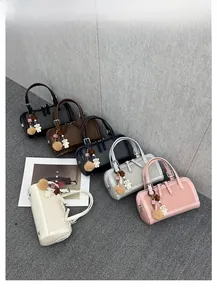 Multi-color canvas and leather boston handbags with cute bear and pom-pom charms