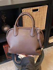 Dark brown lychee grain leather shell bag with top handles and adjustable strap