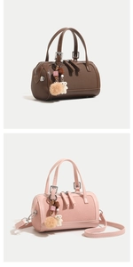 Detail of Boston-style barrel bags in brown and pink with textures and cute charms