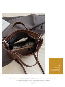 Top view showing spacious interior with zipper compartment for phone and makeup