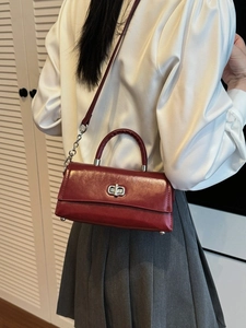 Retro dark red leather crossbody handbag for women with silver clasp and chain strap