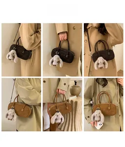 Multiple views of a vintage mini bowling bag with plush bunny charm and shoulder strap