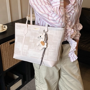 Large capacity canvas tote bag for women in cream white with stylish pony charm