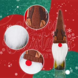 Detailed view of Rudolf gnome wine bottle cover with knit texture and felt antlers