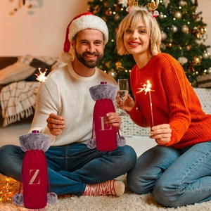 Velvet Christmas wine bottle covers with faux fur trim and gold embroidered letters