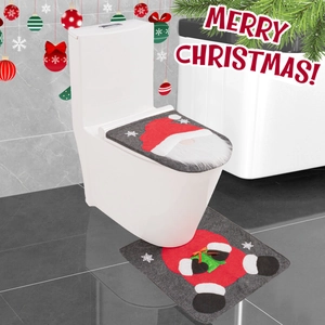 Detail of Christmas gnome toilet seat cover and matching non-slip floor mat set