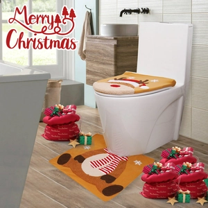 Two-piece Christmas reindeer toilet seat cover and floor mat set in festive ginger plush