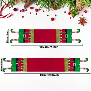 Christmas elf table runner with red fabric and stripe legs on white wood background