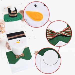 Detailed view of 3-piece Christmas snowman toilet set with non-slip backing and festive bow