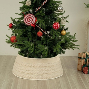 Macro detail of cream white chunky knit Christmas tree collar with cable texture
