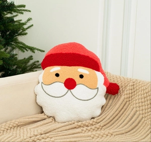 Close-up of Santa Claus plush pillow with soft lamb wool texture on a beige sofa
