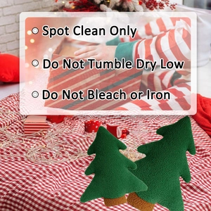 Close-up of green boucle Christmas tree pillows with soft texture and care instructions
