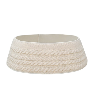 Elegant cream cable knit Christmas tree collar with premium textured finish on white
