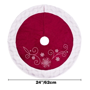 Macro shot of 24-inch red velvet Christmas tree skirt with silver embroidery and white lace
