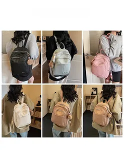 Close-up showing various colors of the stylish faux leather backpack for women
