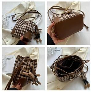 Detail views of retro houndstooth bucket bag with adjustable strap and bear charm