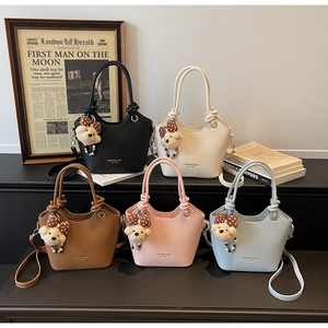 Litchi pattern bucket bags in multiple colors with cute teddy bear charms