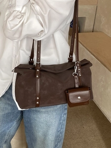 Dark brown large capacity shoulder bag with leather straps and mini coin purse accessory