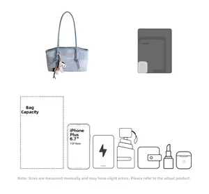 Grand sac fourre-tout bleu clair montrant le rangement interne pour portable et accessoires